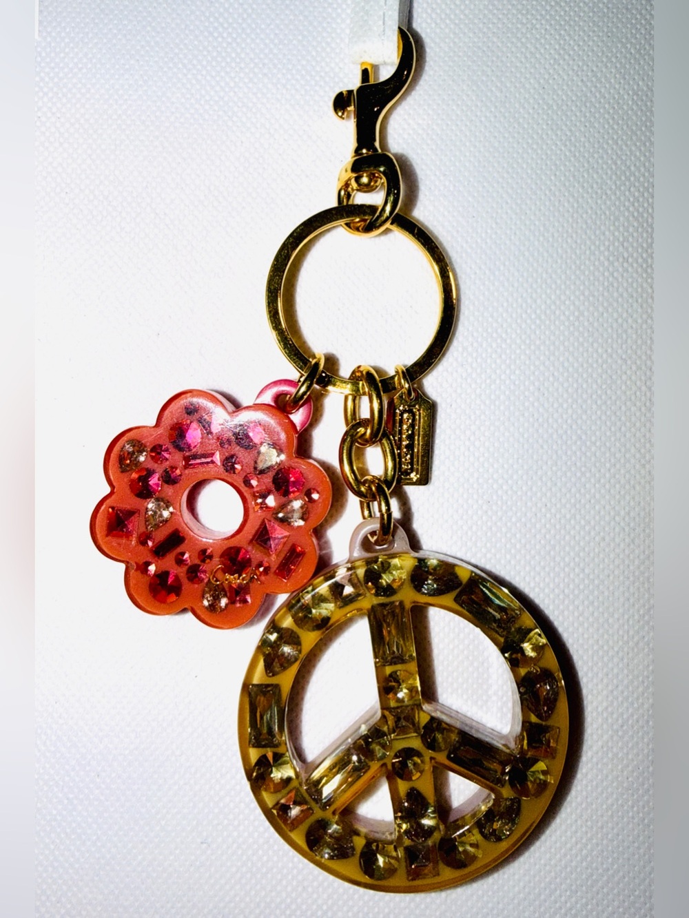 Coach Gold-Tone Peace Sign & Orange-Red Flower Charm Keychain